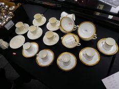 5 Wedgwood 'Patrician' coffee cups and saucers together with Royal Doulton 'Royal Gold' examples, so
