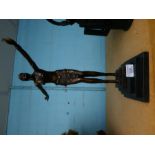 A reproduction bronze style figure of dancing Art Deco lady on square base