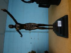 A reproduction bronze style figure of dancing Art Deco lady on square base