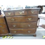 Mahogany chest of drawers with 3 short drawers above 3 long on bracket supports and carved canted co