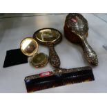 Silver dressing table set consisting of two brushes, hand mirror, comb and compact, mirror and brush