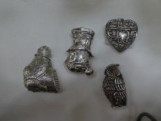 Four interesting silver vesta cases of a face AF, man , owl and heart, various hallmarks and very or