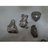 Four interesting silver vesta cases of a face AF, man , owl and heart, various hallmarks and very or