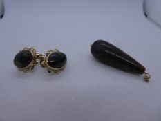 Pair of 9ct yellow gold tigers eye oval earrings marked 9ct and similar pendant