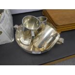 Circular silver plated fruit bowl on feet and 3 tankards