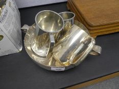 Circular silver plated fruit bowl on feet and 3 tankards