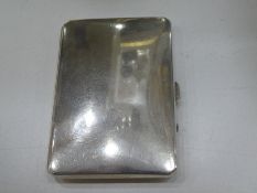 Silver cigarette case hallmarked Birmingham, 1945 Henry Williamson Ltd with gilt interior, Gross wei