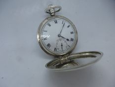 A Vintage silver hallmarked pocket watch, winds and ticks