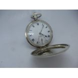 A Vintage silver hallmarked pocket watch, winds and ticks