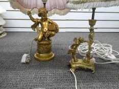 Pretty brass table lamp in the form of a fairy together with a gilt example in the form of a cherub