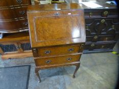 Walnut fitted bureau of small proportions