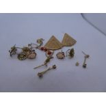 Quantity of 9ct and yellow metal and other earrings, incl yellow metal starburst ex 7.2g