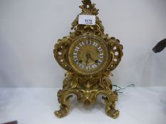 19th Century french gilt ormolu mantle clock with porcelain roman numerals to dial