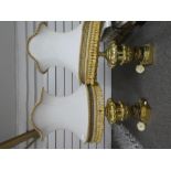 Pair of decretive gilt metal table lamps