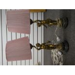 Pair of gilt metal cherub lamp bases on marble plinths, entitles 'La Source' Par Ferrand and 'La For