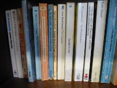 Shelf of vintage Penguin, Pan, and Puffin paperbacks