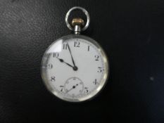 A Late 19th/Early 20th Century hallmarked silver pocket watch with enameled dial, winds and ticks