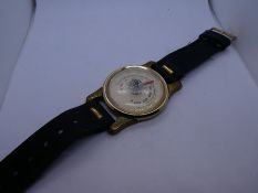 Vintage English made wrist strap with a temperature guage attached, on a black leather strap