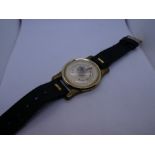 Vintage English made wrist strap with a temperature guage attached, on a black leather strap