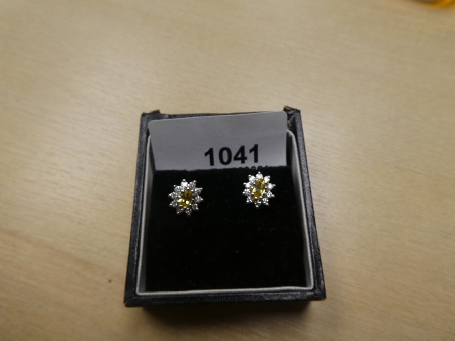 Pair of 18ct white and gold cluster earrings with central yellow sapphire surrounded by diamond chip - Image 2 of 2