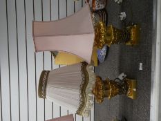 Pair of decretive gilt metal table lamps