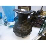 Art Nouveau spelter jug depicting two female nudes in a stream, one forming the handle of the jug, s