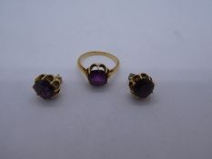Yellow metal dress ring set with a faceted amethyst together with a matching pair earrings , size M