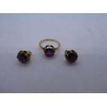 Yellow metal dress ring set with a faceted amethyst together with a matching pair earrings , size M