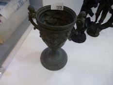 Pewter two handled trophy cup depicting cherubs