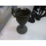 Pewter two handled trophy cup depicting cherubs