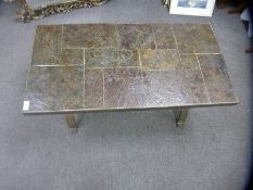 Heavy tile top rectangular coffee table on a wrought metal base