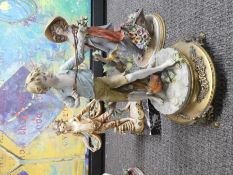 Continental figure of a young boy with catapult on brass plinth, another similar model of a girl and