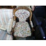 Antique oak carved armchair with tapestry seat and buttoned back