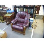 Leather and wooden framed armchair