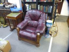 Leather and wooden framed armchair