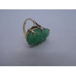 9ct yellow gold dress ring set with green carved stone, size P, gross weight 8.2g