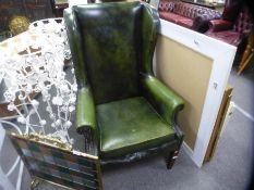 Vintage green leather buttoned and studded wingback armchair