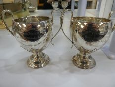 Two matching silver trophy cups with engraving, ornate design pedastal foot, hallmarked, Sheffield 1