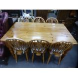 Victorian style waxed pine farmhouse table with set of 6 wheelback chairs