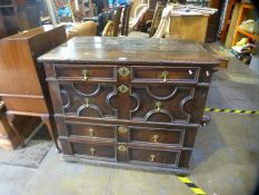 Early 18th Century Oak block fronted chest of 2 short over 3 long drawers complete with panel sides