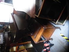 Vintage drop flap circular coffee table and a drop leaf tea trolley