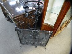 Hand crafted ornate design floor standing jardinière stand and a similar fire guard