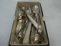 A quantity of silver cutlery of various hallmarks to include mother of pearl handled cutlery, spoons