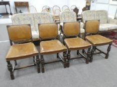 Set of 4 carved oak chairs with tan leather studded seat and backs