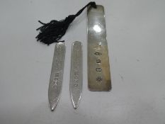 A silver bookmark hallmarked Birmingham 2000, Harrison Brothers and Howson, with two Scottish silver