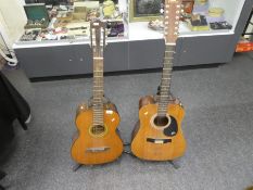 2 Vintage acoustic guitars marked KC333 and Palmer