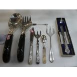 A quantity of silver flatware to include mother of pearl handled fruit knife and spoon, silver handl