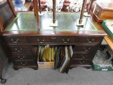 Vintage mahogany pedestal desk with green tooled leather above 9 drawers