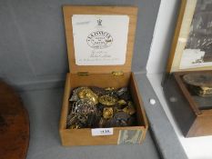 Box of vintage Military badges and buttons