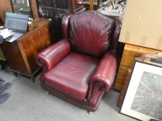 Thomas Lloyd Oxblood leather armchair on castors